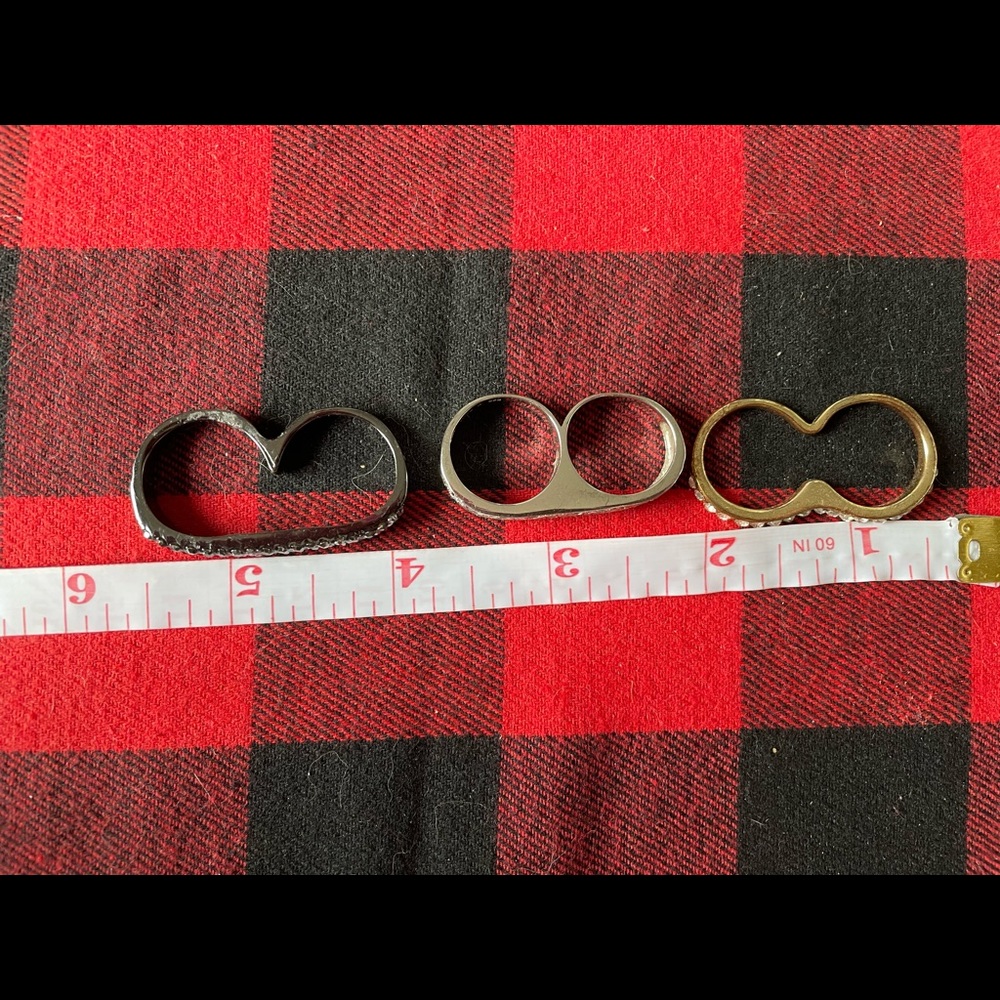 Three knuckle rings